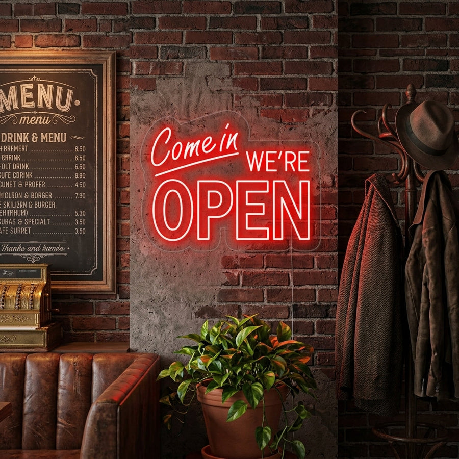 Neon LED-bord in rood met tekst “Come In We’re Open”, wanddecoratie voor winkel of bar.