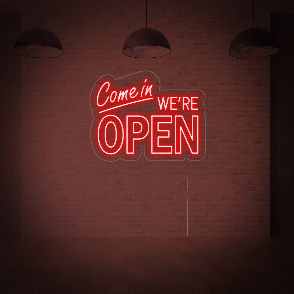 Neon LED-bord in rood met tekst “Come In We’re Open”, wanddecoratie voor winkel of bar.