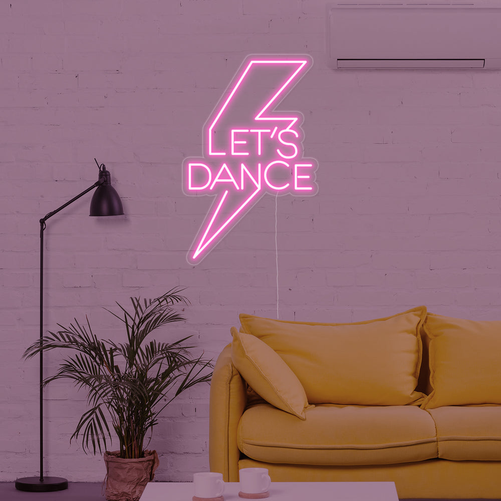 Roze neon LED “Let’s Dance” met bliksem, feestelijke verlichting voor dans- of partyruimte.